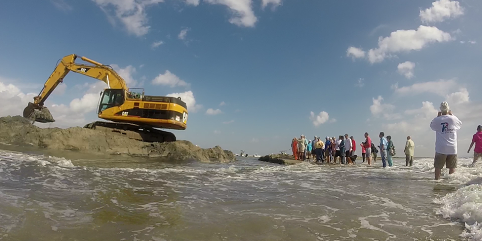 After nearly 30 years of planning and 4 months of dredging, Cedar Bayou was officially reopened in September 2014. This is the first water to flow through what eventually became the main channel.